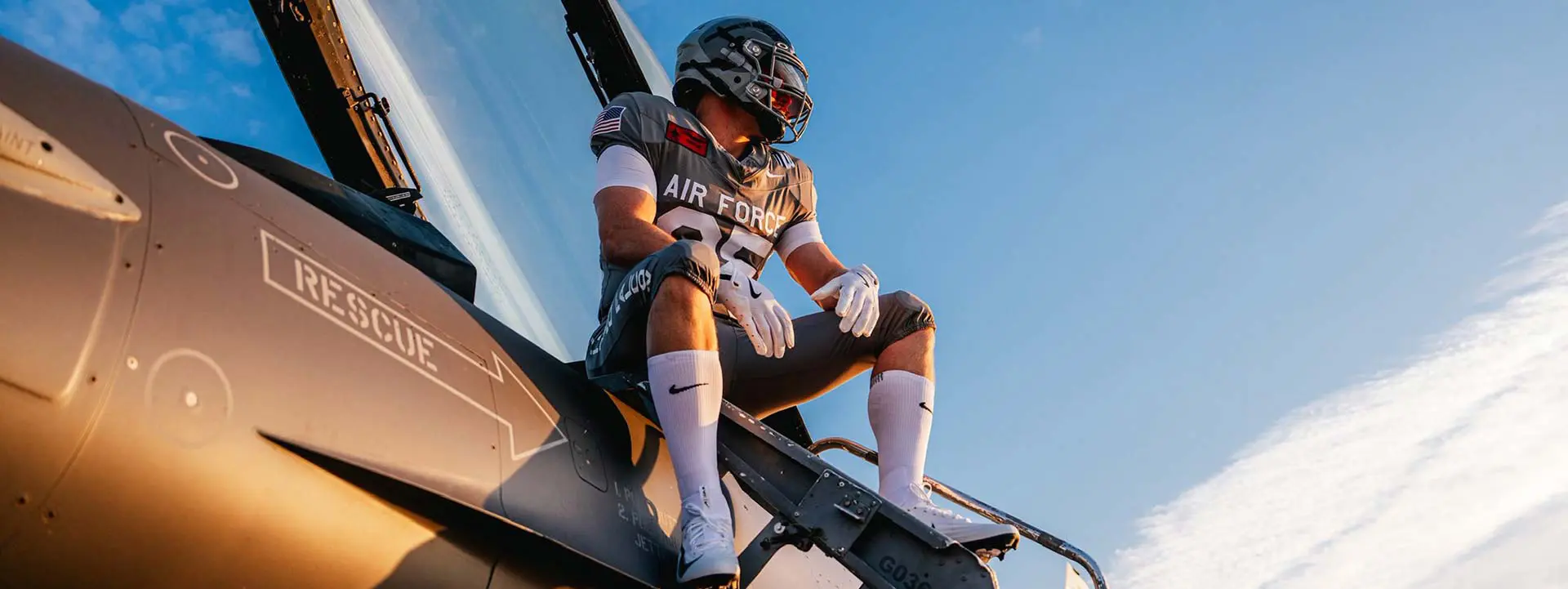 Football player in front of helicopter